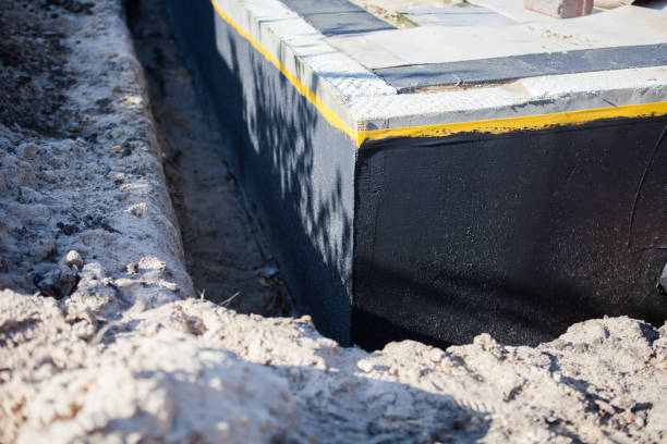 Professional Emergency Waterproofing technician working in Lambertville, NJ